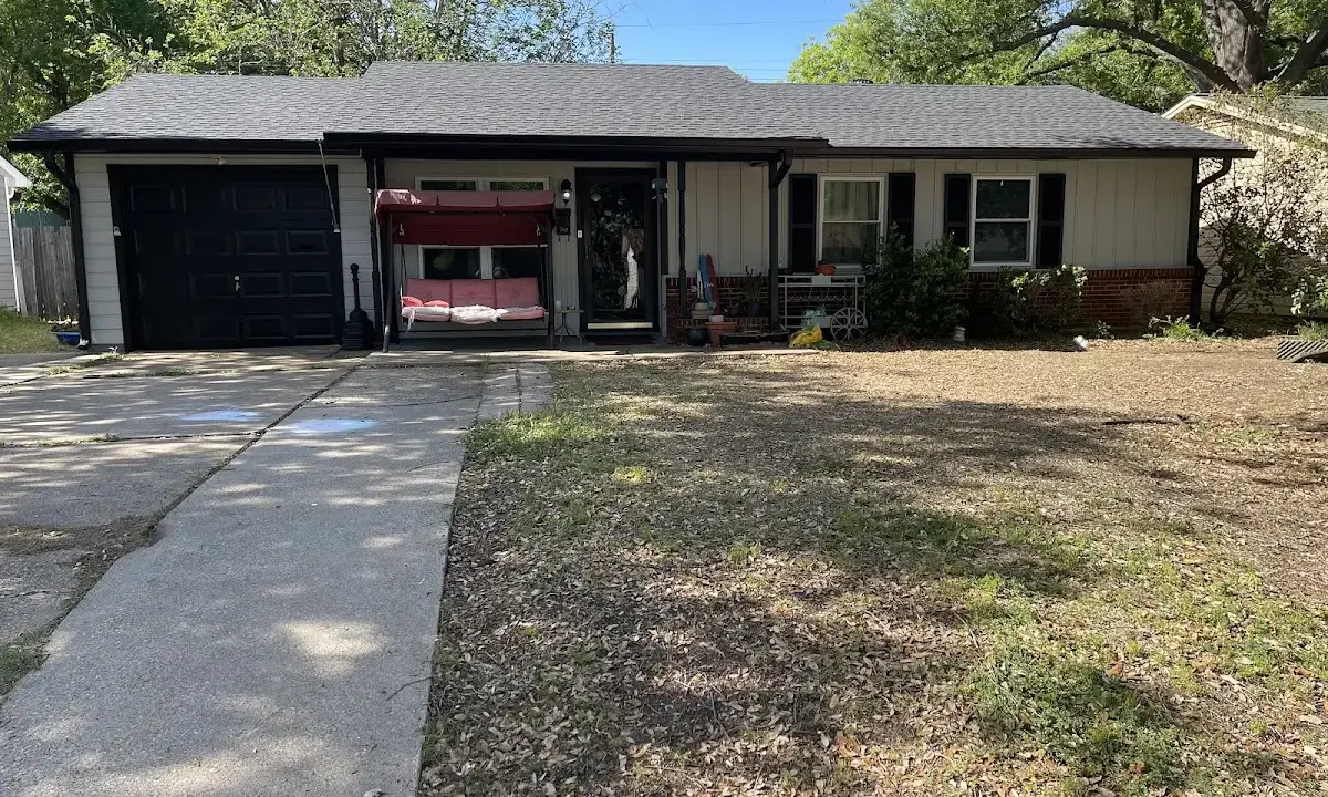 Wind Damage Roof Repair crew at work on a residential roof in Valrico